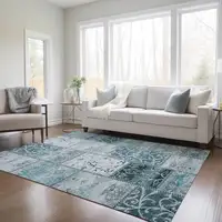 Photo of 3' X 5' Teal Patchwork Washable Non Skid Indoor Outdoor Area Rug