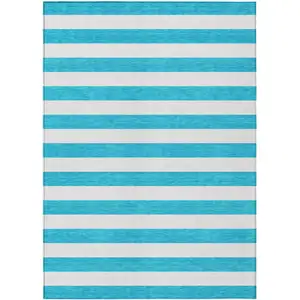 Photo of 3' X 4' Teal Striped Washable Non Skid Indoor Outdoor Area Rug