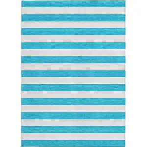 Photo of 3' X 5' Teal Striped Washable Non Skid Indoor Outdoor Area Rug