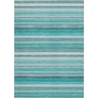 Photo of 3' X 5' Teal Striped Washable Non Skid Indoor Outdoor Area Rug