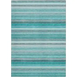 Photo of 3' X 5' Teal Striped Washable Non Skid Indoor Outdoor Area Rug