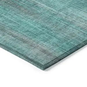 Photo of 3' X 4' Teal Striped Washable Non Skid Indoor Outdoor Area Rug