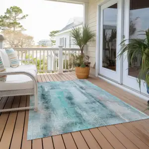 Photo of 3' X 4' Teal Washable Non Skid Indoor Outdoor Area Rug