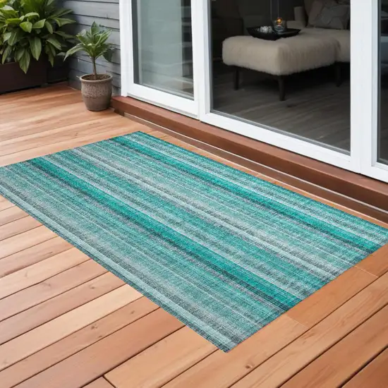 3' X 4' Teal and Gray Striped Washable Non Skid Indoor Outdoor Area Rug Photo 1