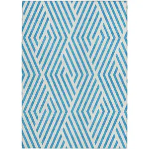 Photo of 3' X 4' Teal and White Geometric Washable Non Skid Indoor Outdoor Area Rug