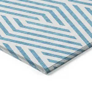 Photo of 3' X 5' Teal and White Geometric Washable Non Skid Indoor Outdoor Area Rug