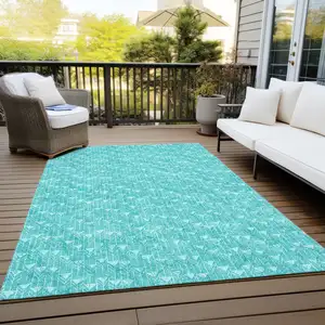 Photo of 3' X 5' Turquoise Geometric Washable Non Skid Indoor Outdoor Area Rug