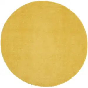 Photo of 4' X 4' Yellow Round Non Skid Indoor Outdoor Area Rug