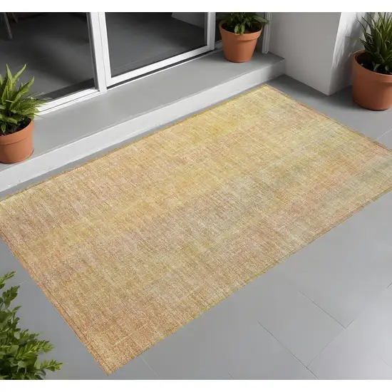 3' X 4' Yellow and Orange Striped Washable Non Skid Indoor Outdoor Area Rug Photo 1