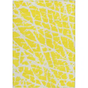 Photo of 3' X 4' Yellow and White Abstract Washable Non Skid Indoor Outdoor Area Rug