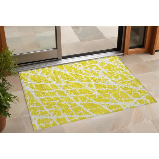 Yellow and White Abstract Washable Non Skid Indoor Outdoor Area Rug Photo 1