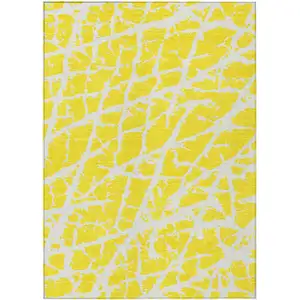 Photo of 3' X 5' Yellow and White Abstract Washable Non Skid Indoor Outdoor Area Rug