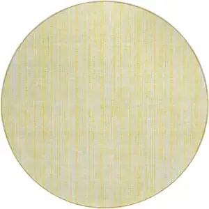 Photo of 8' Yellow And Ivory Round Striped Washable Indoor Outdoor Area Rug