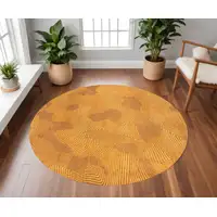 Photo of 5' Yellow Round Abstract Non Skid Area Rug