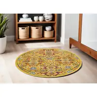 Photo of 5' Yellow Round Floral Power Loom Area Rug