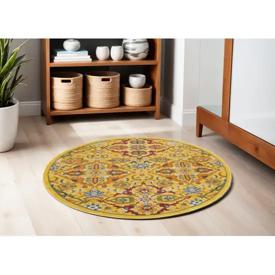 5' Yellow Round Floral Power Loom Area Rug Photo 1