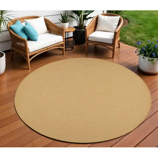 8' Yellow Round Power Loom Area Rug Photo 1