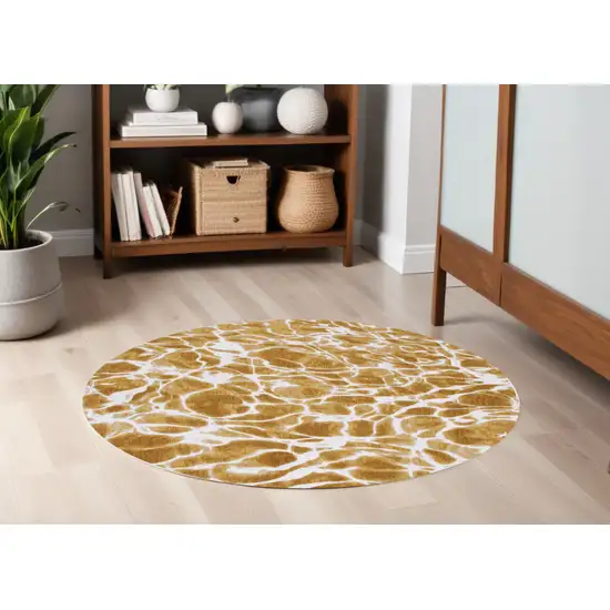 5' Yellow and Brown Round Abstract Non Skid Area Rug Photo 1