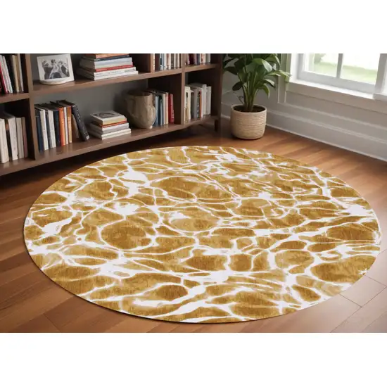 8' Yellow and Brown Round Abstract Non Skid Area Rug Photo 1