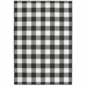 Photo of 5'x8' Black and Ivory Gingham Indoor Outdoor Area Rug