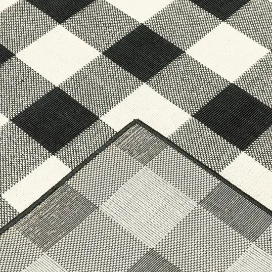 5'x8' Black and Ivory Gingham Indoor Outdoor Area Rug Photo 3