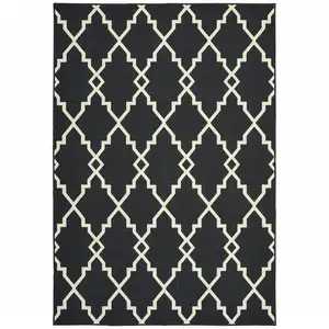 Photo of 4'x6' Black and Ivory Trellis Indoor Outdoor Area Rug