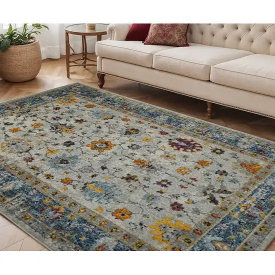 Blue and Orange Floral Power Loom Area Rug Photo 1