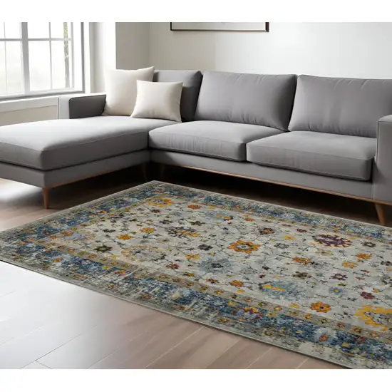 Blue and Orange Floral Power Loom Area Rug Photo 1