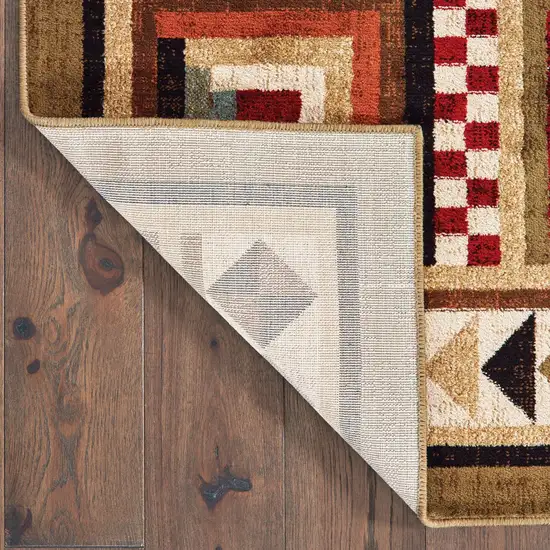 4'x6' Brown and Red Ikat Patchwork Area Rug Photo 3