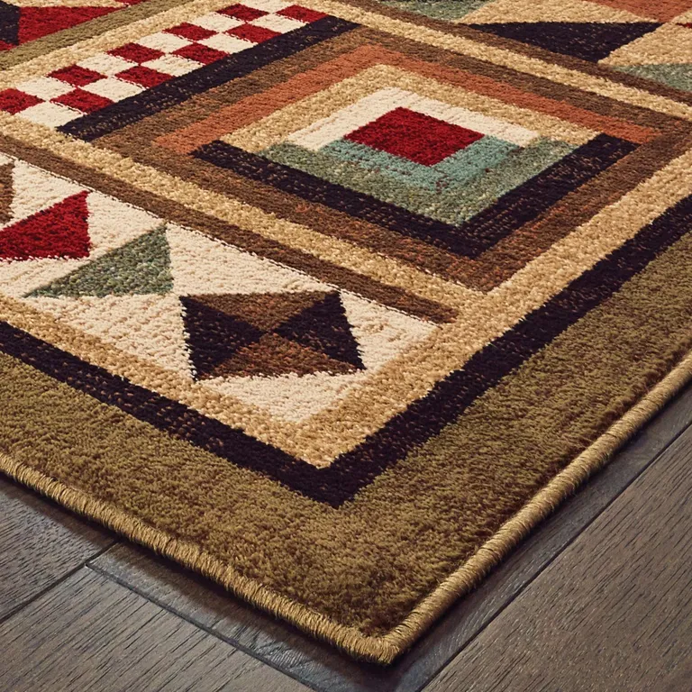 5'x7' Brown and Red Ikat Patchwork Area Rug Photo 2