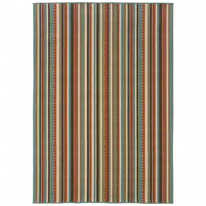 Photo of 2'x4' Green and Brown Striped Indoor Outdoor Scatter Rug