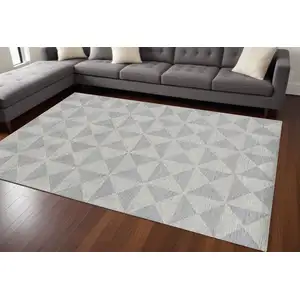 Photo of 8'x11' Ivory Hand Tufted Space Dyed Geometric Indoor Area Rug