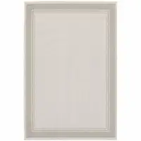 Photo of 7'x9' Ivory and Gray Bordered Indoor Outdoor Area Rug