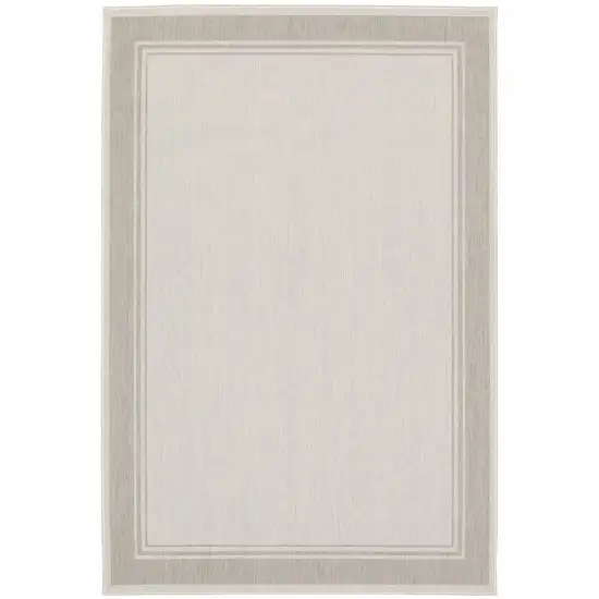 7'x9' Ivory and Gray Bordered Indoor Outdoor Area Rug Photo 1