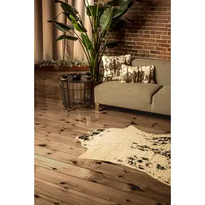 Photo of 4'x 5' Off White Black And Gold Faux Cowhide Non Skid Area Rug