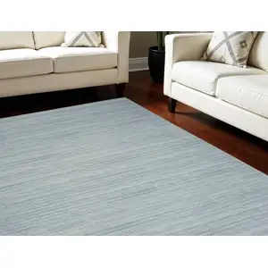 Photo of Aqua Abstract Washable Area Rug