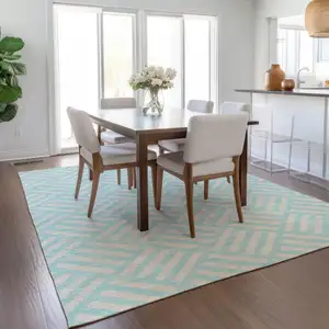 Photo of Aqua And Ivory Geometric Washable Indoor Outdoor Area Rug