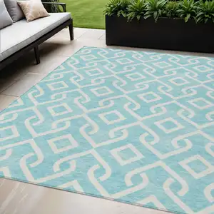 Photo of Aqua And Ivory Geometric Washable Indoor Outdoor Area Rug