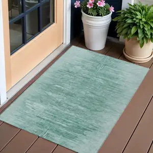 Photo of Aqua And Teal Blue Abstract Washable Indoor Outdoor Area Rug