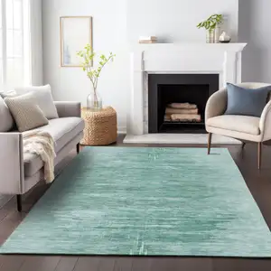 Photo of Aqua And Teal Blue Abstract Washable Indoor Outdoor Area Rug