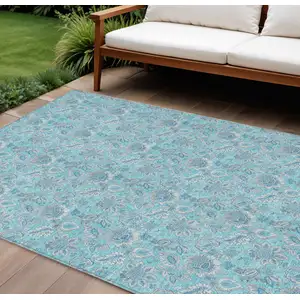 Photo of Aqua Blue And Silver Floral Washable Indoor Outdoor Area Rug