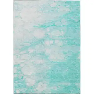 Photo of Aqua Ivory And Teal Blue Abstract Washable Indoor Outdoor Area Rug