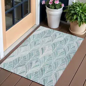 Photo of Aqua Mint Green And Silver Geometric Washable Indoor Outdoor Area Rug