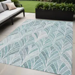 Photo of Aqua Mint Green And Silver Geometric Washable Indoor Outdoor Area Rug