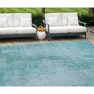 Photo of Aqua Teal Blue And Gray Abstract Washable Indoor Outdoor Area Rug