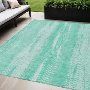 Photo of Aqua Teal Blue And Ivory Botanical Leaves Washable Indoor Outdoor Area Rug