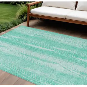 Photo of Aqua Teal Blue And Ivory Botanical Leaves Washable Indoor Outdoor Area Rug