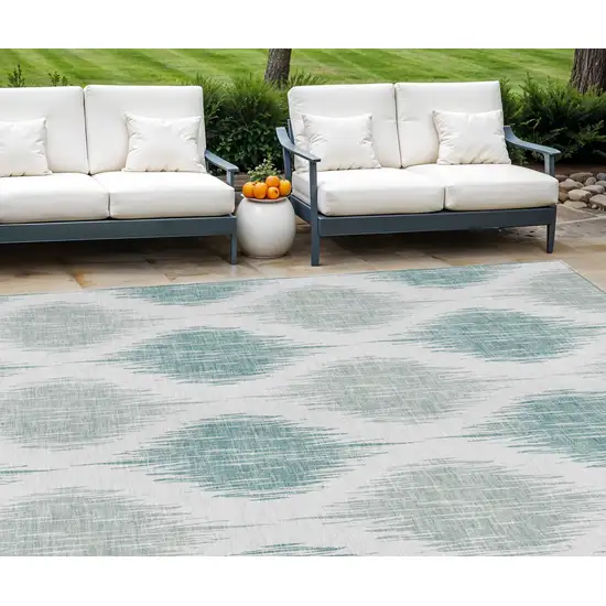 Aqua Teal Blue And Ivory Ikat Washable Indoor Outdoor Area Rug Photo 1