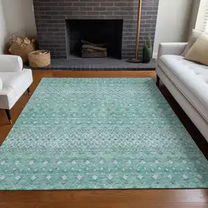 Photo of Aqua Teal Blue And Ivory Tribal Washable Indoor Outdoor Area Rug