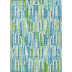 Photo of Aqua Teal Blue And Lime Green Abstract Washable Indoor Outdoor Area Rug